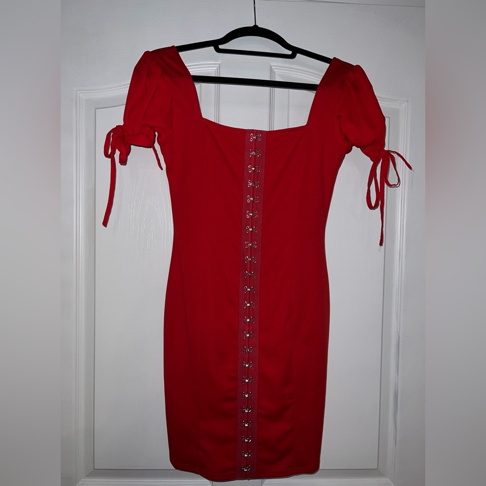 Shortsleeved with back zipper, new with tags